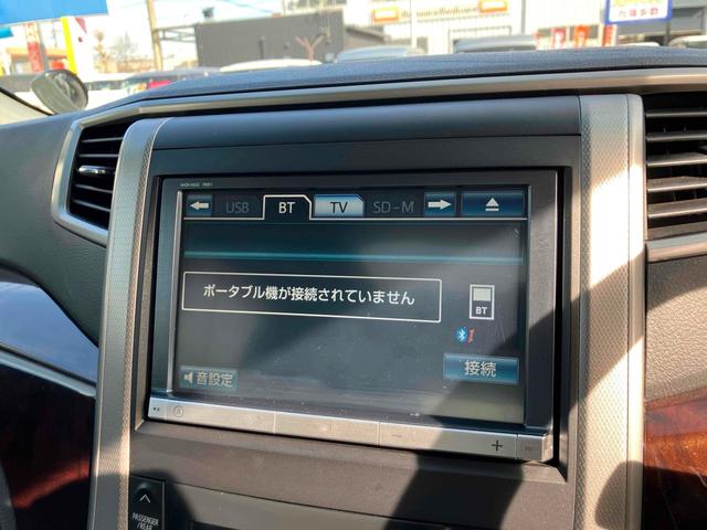 ヴェルファイア ２．４Ｚ　ＥＴＣ　バックカメラ　ナビ　ＴＶ　クリアランスソナー　オートクルーズコントロール　両側スライド・片側電動　７人乗り　ＨＩＤ　Ｗサンルーフ　スマートキー　電動ミラー　３列シート　オットマン　ＣＶＴ（7枚目）