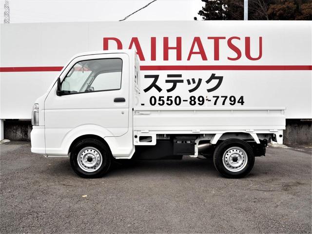 KCエアコン・パワステ 4WD メーカー保証・純正ラジオ・オートライト・横滑り防止・レべライザー・WエアB・ABS・AC・PS(11枚目)