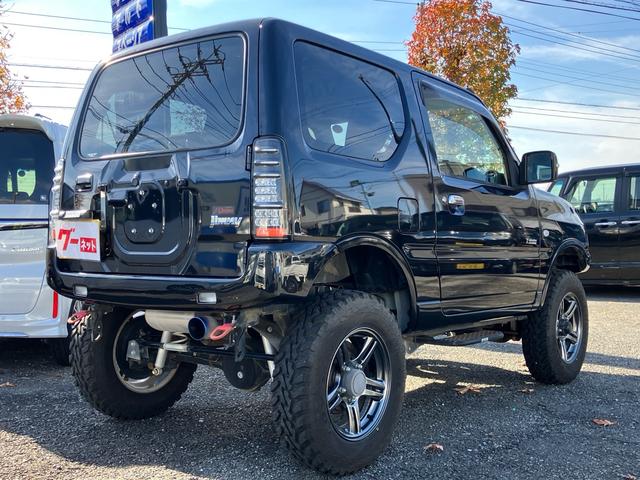 ジムニー クロスアドベンチャー 4WD ターボ リフトUP MTタイヤ タニグチ:FRPバンパー/スキッドプレート/サスペンションキット/サイドステップ マフラー LEDテール 1オーナー禁煙記録簿 ナビ Bカメラ ドラレコ ETC(5枚目)