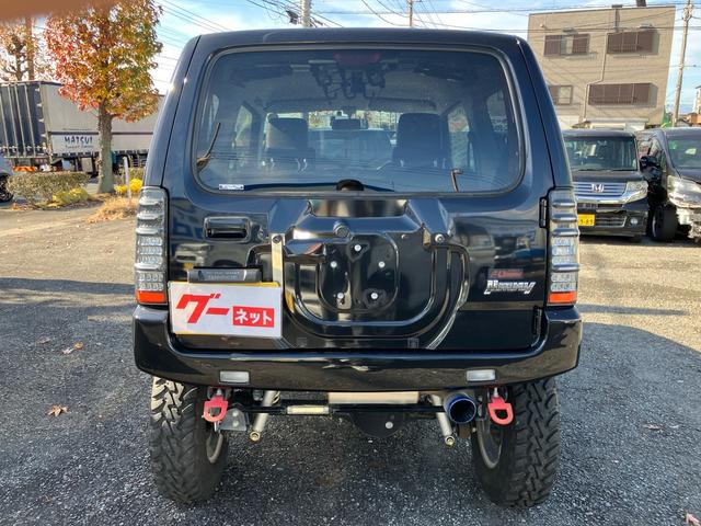 ジムニー クロスアドベンチャー 4WD ターボ リフトUP MTタイヤ タニグチ:FRPバンパー/スキッドプレート/サスペンションキット/サイドステップ マフラー LEDテール 1オーナー禁煙記録簿 ナビ Bカメラ ドラレコ ETC(6枚目)