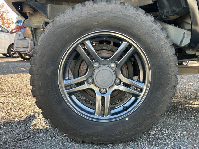 ジムニー クロスアドベンチャー 4WD ターボ リフトUP MTタイヤ タニグチ:FRPバンパー/スキッドプレート/サスペンションキット/サイドステップ マフラー LEDテール 1オーナー禁煙記録簿 ナビ Bカメラ ドラレコ ETC(18枚目)