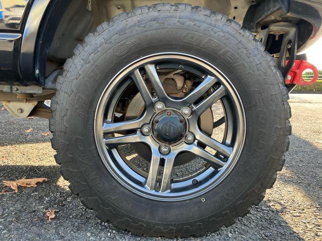 ジムニー クロスアドベンチャー 4WD ターボ リフトUP MTタイヤ タニグチ:FRPバンパー/スキッドプレート/サスペンションキット/サイドステップ マフラー LEDテール 1オーナー禁煙記録簿 ナビ Bカメラ ドラレコ ETC(41枚目)