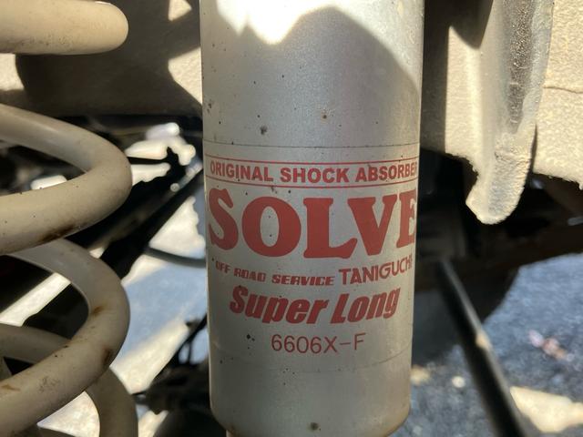 ジムニー クロスアドベンチャー 4WD ターボ リフトUP MTタイヤ タニグチ:FRPバンパー/スキッドプレート/サスペンションキット/サイドステップ マフラー LEDテール 1オーナー禁煙記録簿 ナビ Bカメラ ドラレコ ETC(48枚目)