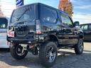 ジムニー クロスアドベンチャー 4WD ターボ リフトUP MTタイヤ タニグチ:FRPバンパー/スキッドプレート/サスペンションキット/サイドステップ マフラー LEDテール 1オーナー禁煙記録簿 ナビ Bカメラ ドラレコ ETC(5枚目)