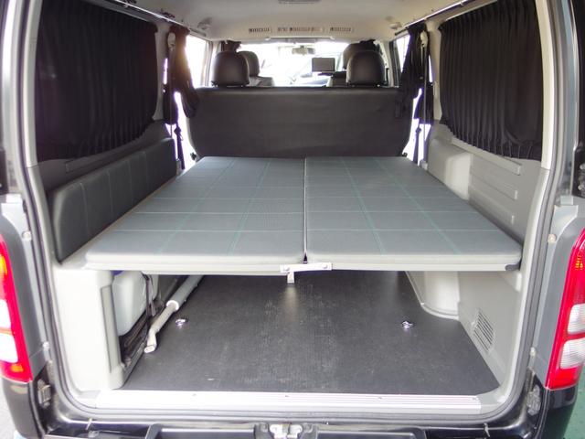 ハイエースバン ロングスーパーGLマルチロールトランスポータタイプII MRT専用荷室フロア ローダウン 外15インチアルミ ベットキット 皮調シートカバー 外ナビ Bカメラ フルセグ ETC 2列目モニター 室内灯LED 純パーツ社内積み ユーザー買取 禁煙(5枚目)