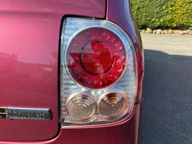 アルトラパンショコラ X ナビ付 1年保証付 ナビ半キャン セキュリティー アイドリング 電格ドアミラー 全席PW ベンチシ-ト スマ-トキ- フルフラットシート 地デジTV WエアB 衝突安全ボディ 運転席エアバッグ AC(61枚目)