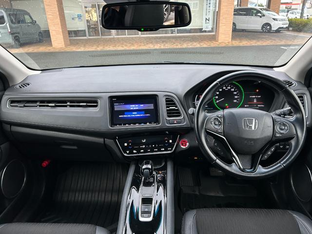 ヴェゼル ハイブリッドＺ・ホンダセンシング　ワンオーナー・禁煙車・ナビ・ドラレコ　レーダーサポート　１オーナ－　ＤＶＤ再生機能　横滑り防止システム　バックアイカメラ　フルセ　シートヒーター付　スマ－トキ－　ＥＣＯモード　パワーウィンド　革シート（6枚目）