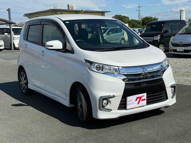 ｅＫカスタム Ｔセーフティパッケージ　全周囲カメラ　ナビ　ＴＶ　オートクルーズコントロール　衝突被害軽減システム　オートマチックハイビーム　オートライト　ＨＩＤ　スマートキー　アイドリングストップ　電動格納ミラー　シートヒーター（13枚目）