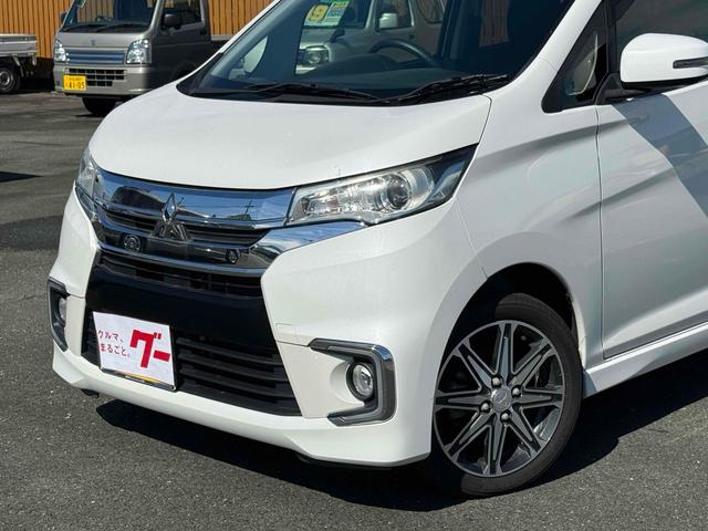 ｅＫカスタム Ｔセーフティパッケージ　全周囲カメラ　ナビ　ＴＶ　オートクルーズコントロール　衝突被害軽減システム　オートマチックハイビーム　オートライト　ＨＩＤ　スマートキー　アイドリングストップ　電動格納ミラー　シートヒーター（24枚目）