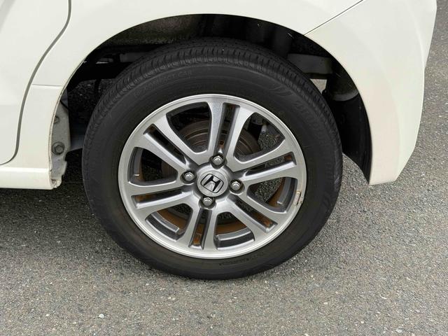 N-BOX G・Lパッケージ バックカメラ 両側スライド・片側電動 ナビ TV スマートキー アイドリングストップ 電動格納ミラー ベンチシート CVT 盗難防止システム ABS ESC CD DVD再生 USB アルミホイール(18枚目)