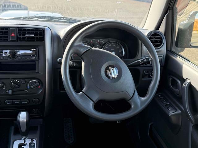 ジムニー ＸＣ　４ＷＤ　電動格納ミラー　ＡＴ　ＡＢＳ　ＣＤ　ルーフレール　アルミホイール　衝突安全ボディ　エアコン　パワーステアリング（3枚目）