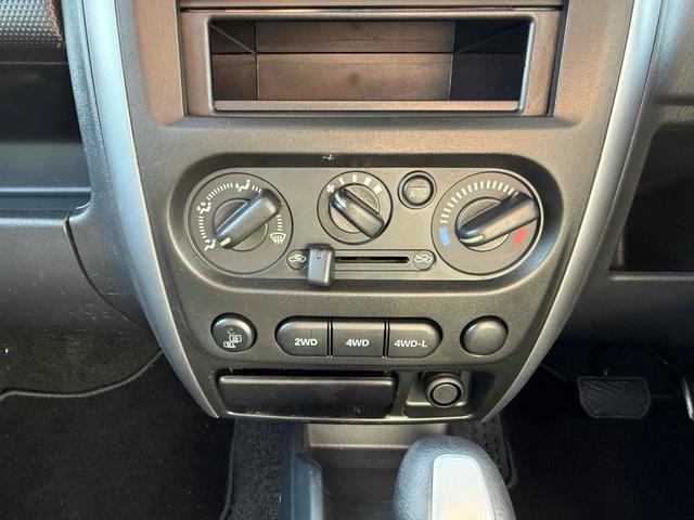 ジムニー ＸＣ　４ＷＤ　電動格納ミラー　ＡＴ　ＡＢＳ　ＣＤ　ルーフレール　アルミホイール　衝突安全ボディ　エアコン　パワーステアリング（5枚目）