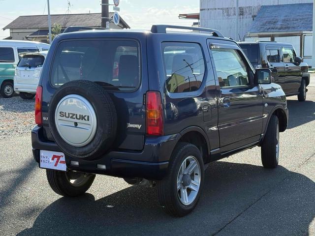 ジムニー ＸＣ　４ＷＤ　電動格納ミラー　ＡＴ　ＡＢＳ　ＣＤ　ルーフレール　アルミホイール　衝突安全ボディ　エアコン　パワーステアリング（17枚目）