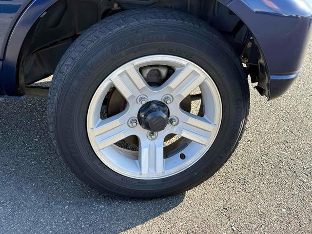 ジムニー ＸＣ　４ＷＤ　電動格納ミラー　ＡＴ　ＡＢＳ　ＣＤ　ルーフレール　アルミホイール　衝突安全ボディ　エアコン　パワーステアリング（19枚目）
