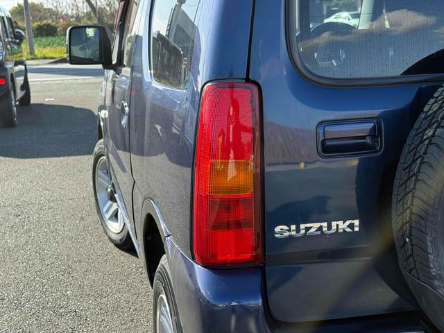 ジムニー ＸＣ　４ＷＤ　電動格納ミラー　ＡＴ　ＡＢＳ　ＣＤ　ルーフレール　アルミホイール　衝突安全ボディ　エアコン　パワーステアリング（21枚目）