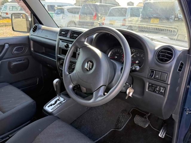 ジムニー ＸＣ　４ＷＤ　電動格納ミラー　ＡＴ　ＡＢＳ　ＣＤ　ルーフレール　アルミホイール　衝突安全ボディ　エアコン　パワーステアリング（27枚目）