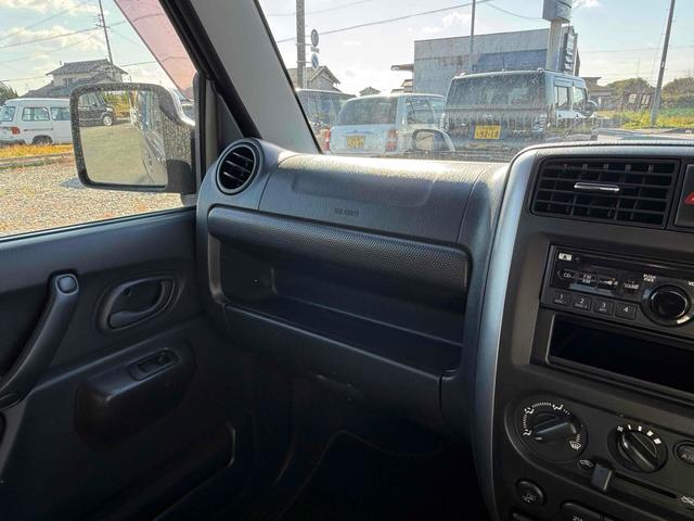 ジムニー ＸＣ　４ＷＤ　電動格納ミラー　ＡＴ　ＡＢＳ　ＣＤ　ルーフレール　アルミホイール　衝突安全ボディ　エアコン　パワーステアリング（28枚目）