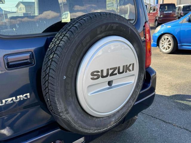 ジムニー ＸＣ　４ＷＤ　電動格納ミラー　ＡＴ　ＡＢＳ　ＣＤ　ルーフレール　アルミホイール　衝突安全ボディ　エアコン　パワーステアリング（35枚目）