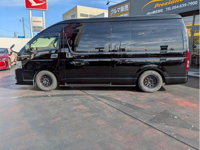 ハイエースコミューター スーパーロングGL 構造変更10人乗り普通免許OK トランポ仕様 ナビフルセグ パノラマモニター デジタルインナーミラー 電動スライドドア 社外エアロ ローダウン ワンオーナー 8ナンバー登録 LEDヘッドライト 禁煙車(8枚目)