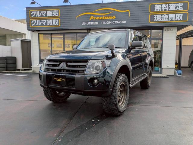 パジェロ ロング　エクシード　新品サス２インチリフトアップ　社外１７ＡＷ　ジオランダーＭ／Ｔ　サイドステップ・グリル・オーバーフェンダー・ミラー・アンダーカバーチッピング塗装　レザーシート　ナビ　バックモニター　ワンオーナー禁煙車（9枚目）