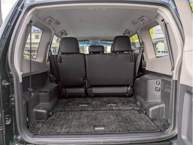 パジェロ ロング　エクシード　新品サス２インチリフトアップ　社外１７ＡＷ　ジオランダーＭ／Ｔ　サイドステップ・グリル・オーバーフェンダー・ミラー・アンダーカバーチッピング塗装　レザーシート　ナビ　バックモニター　ワンオーナー禁煙車（15枚目）