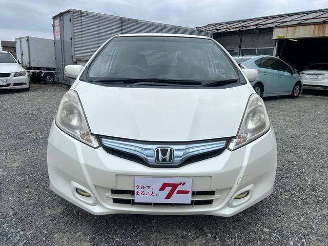 フィットハイブリッド ナビプレミアムセレクション パワーウィンドウ シートヒーター付 リヤカメラ HDDナビ オートライト ナビ・TV AUTOエアコン ETC車載器(2枚目)