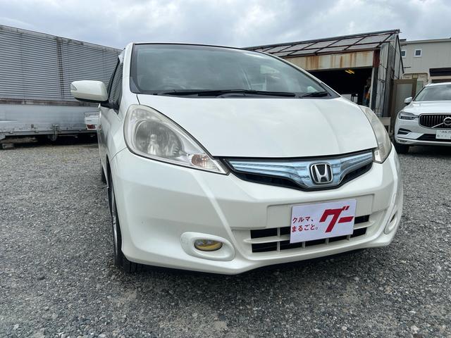 フィットハイブリッド ナビプレミアムセレクション パワーウィンドウ シートヒーター付 リヤカメラ HDDナビ オートライト ナビ・TV AUTOエアコン ETC車載器(3枚目)