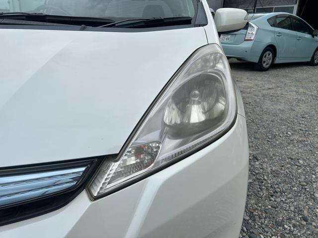 フィットハイブリッド ナビプレミアムセレクション パワーウィンドウ シートヒーター付 リヤカメラ HDDナビ オートライト ナビ・TV AUTOエアコン ETC車載器(5枚目)