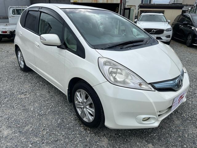 フィットハイブリッド ナビプレミアムセレクション パワーウィンドウ シートヒーター付 リヤカメラ HDDナビ オートライト ナビ・TV AUTOエアコン ETC車載器(9枚目)