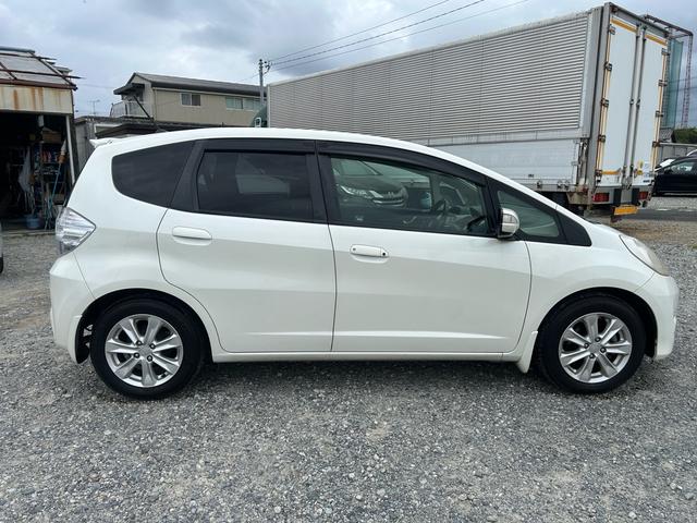 フィットハイブリッド ナビプレミアムセレクション パワーウィンドウ シートヒーター付 リヤカメラ HDDナビ オートライト ナビ・TV AUTOエアコン ETC車載器(12枚目)