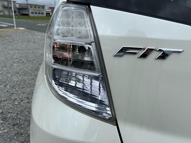 フィットハイブリッド ナビプレミアムセレクション パワーウィンドウ シートヒーター付 リヤカメラ HDDナビ オートライト ナビ・TV AUTOエアコン ETC車載器(14枚目)