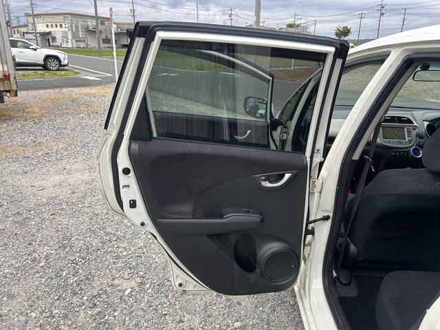 フィットハイブリッド ナビプレミアムセレクション パワーウィンドウ シートヒーター付 リヤカメラ HDDナビ オートライト ナビ・TV AUTOエアコン ETC車載器(25枚目)