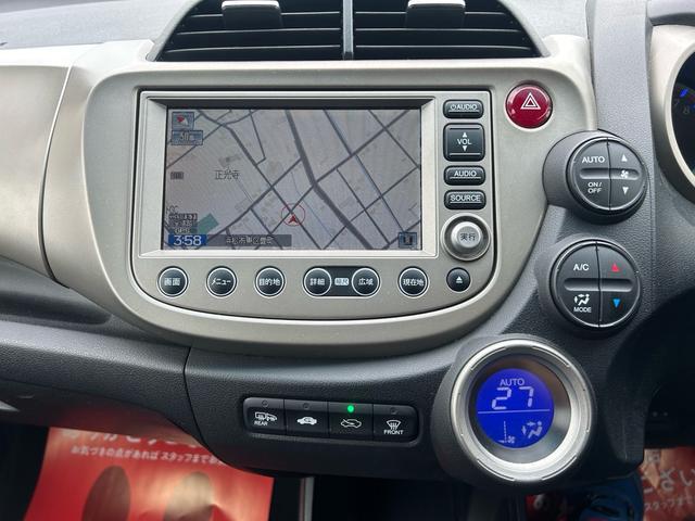 フィットハイブリッド ナビプレミアムセレクション パワーウィンドウ シートヒーター付 リヤカメラ HDDナビ オートライト ナビ・TV AUTOエアコン ETC車載器(32枚目)