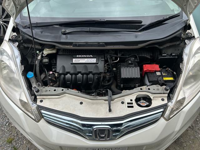 フィットハイブリッド ナビプレミアムセレクション パワーウィンドウ シートヒーター付 リヤカメラ HDDナビ オートライト ナビ・TV AUTOエアコン ETC車載器(42枚目)