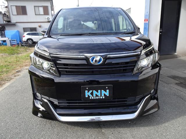 ヴォクシー ハイブリッドV モデリスタフルエアロ アルパイン10インチBIGナビ シートヒーター クルコン リアスポイラー ワイヤレス充電 ステアリングスイッチ 電動スライド LEDヘッド Bカメラ ブルートゥース 修復歴無し(2枚目)