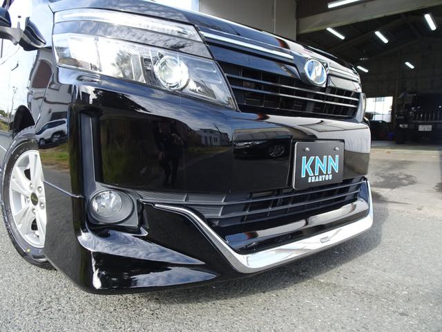 ヴォクシー ハイブリッドV モデリスタフルエアロ アルパイン10インチBIGナビ シートヒーター クルコン リアスポイラー ワイヤレス充電 ステアリングスイッチ 電動スライド LEDヘッド Bカメラ ブルートゥース 修復歴無し(6枚目)