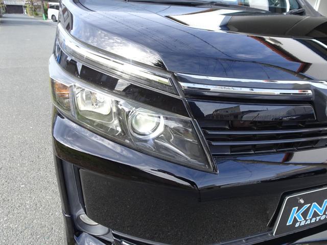 ヴォクシー ハイブリッドV モデリスタフルエアロ アルパイン10インチBIGナビ シートヒーター クルコン リアスポイラー ワイヤレス充電 ステアリングスイッチ 電動スライド LEDヘッド Bカメラ ブルートゥース 修復歴無し(64枚目)