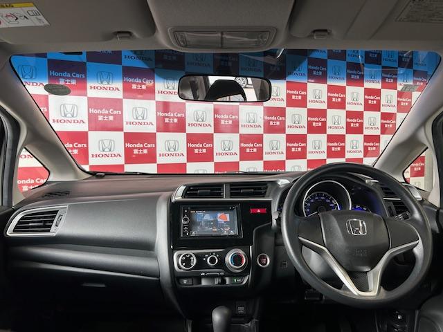 フィット 13G・Fパッケージ ナビワンセグCDDVD再生スマートキープッシュエンジンスタートアイドリングストップ禁煙車2025年10月17日走行距離56764キロ時鑑定済修復歴無(6枚目)