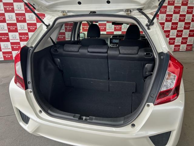 フィット 13G・Fパッケージ ナビワンセグCDDVD再生スマートキープッシュエンジンスタートアイドリングストップ禁煙車2025年10月17日走行距離56764キロ時鑑定済修復歴無(10枚目)