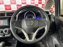 フィット 13G・Fパッケージ ナビワンセグCDDVD再生スマートキープッシュエンジンスタートアイドリングストップ禁煙車2025年10月17日走行距離56764キロ時鑑定済修復歴無(7枚目)