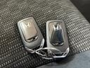 フィット 13G・Fパッケージ ナビワンセグCDDVD再生スマートキープッシュエンジンスタートアイドリングストップ禁煙車2025年10月17日走行距離56764キロ時鑑定済修復歴無(8枚目)