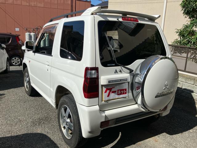 パジェロミニ アクティブフィールドエディション 4WD HDDナビ Rスポイラー 純正アルミホイール 電動格納ミラー キーレスエントリー 背面タイヤカバー 車検9年10月(4枚目)