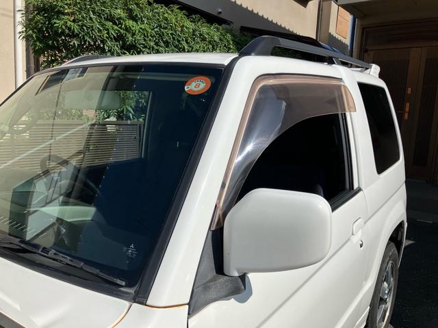 パジェロミニ アクティブフィールドエディション 4WD HDDナビ Rスポイラー 純正アルミホイール 電動格納ミラー キーレスエントリー 背面タイヤカバー 車検9年10月(34枚目)