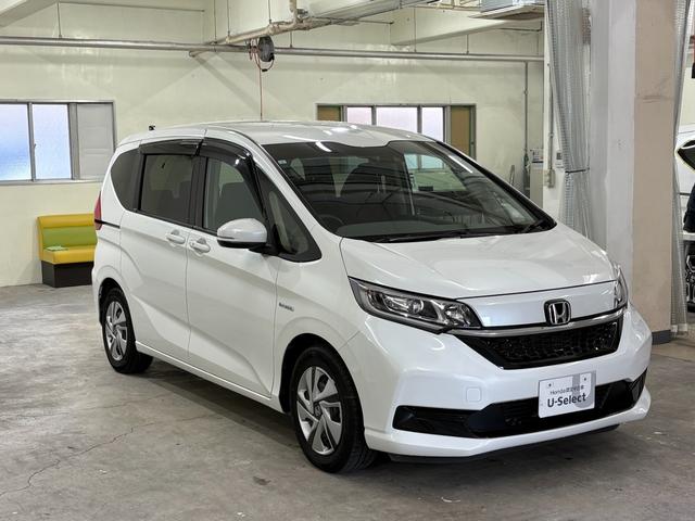 フリードハイブリッド ハイブリッド・Ｇホンダセンシング　ナビフルセグＢカメラＥＴＣＬＥＤ　軽減ブレーキ　キーフリーシステム　１オ－ナ－　記録簿　ＤＶＤ再生可能　サイドカーテンエアバック　禁煙　後カメラ　Ａクルーズ　地デジフルセグＴＶ　ＬＥＤヘッドランプ（6枚目）