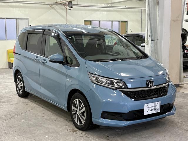 フリードハイブリッド ハイブリッド・Ｇホンダセンシング　ナビフルセグＢカメラＥＴＣＬＥＤＡＷ　軽減ブレーキ　キーフリーシステム　ＤＶＤ再生可能　後カメラ　Ａクルーズ　地デジフルセグＴＶ　ＬＥＤヘッドランプ　シートＨ　横滑防止　ドライブレコーダ　３列シート（6枚目）