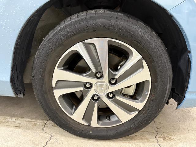 フリードハイブリッド ハイブリッド・Ｇホンダセンシング　ナビフルセグＢカメラＥＴＣＬＥＤＡＷ　軽減ブレーキ　キーフリーシステム　ＤＶＤ再生可能　後カメラ　Ａクルーズ　地デジフルセグＴＶ　ＬＥＤヘッドランプ　シートＨ　横滑防止　ドライブレコーダ　３列シート（11枚目）