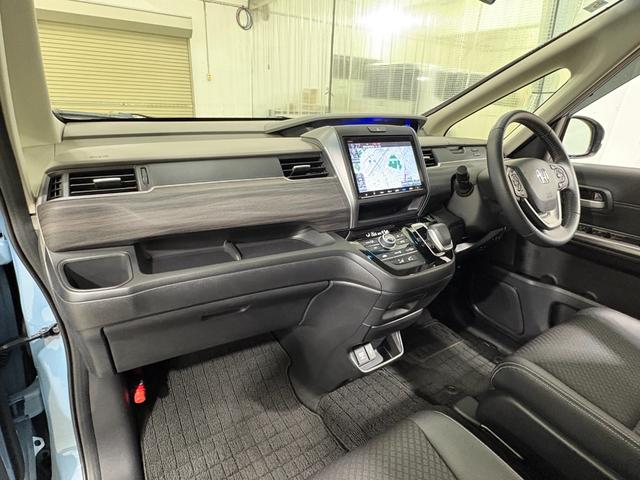 フリードハイブリッド ハイブリッド・Ｇホンダセンシング　ナビフルセグＢカメラＥＴＣＬＥＤＡＷ　軽減ブレーキ　キーフリーシステム　ＤＶＤ再生可能　後カメラ　Ａクルーズ　地デジフルセグＴＶ　ＬＥＤヘッドランプ　シートＨ　横滑防止　ドライブレコーダ　３列シート（30枚目）