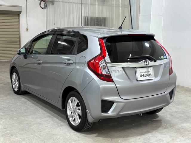 フィットハイブリッド Ｌパッケージ　ナビフルセグＢカメラＥＴＣＬＥＤＡＷ　ナビ＆ＴＶ　地デジフルセグＴＶ　ＵＳＢ　サイドエアバック　ＤＶＤ再生　バックカメラ　オートクルーズコントロール　ＥＳＣ　ＡＵＴＯエアコン　ＡＢＳ　運転席エアバック（2枚目）