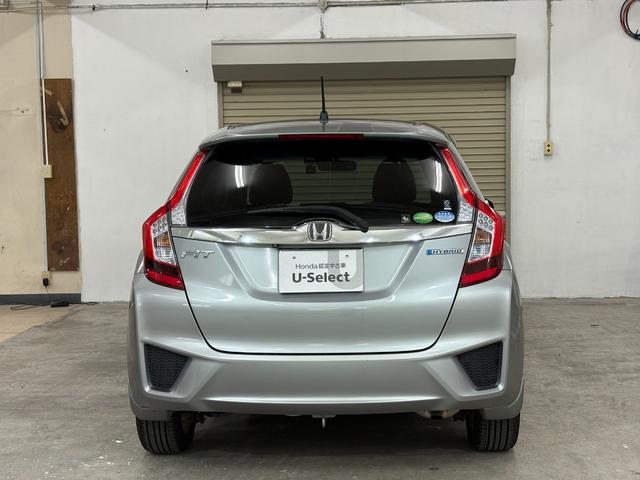 フィットハイブリッド Ｌパッケージ　ナビフルセグＢカメラＥＴＣＬＥＤＡＷ　ナビ＆ＴＶ　地デジフルセグＴＶ　ＵＳＢ　サイドエアバック　ＤＶＤ再生　バックカメラ　オートクルーズコントロール　ＥＳＣ　ＡＵＴＯエアコン　ＡＢＳ　運転席エアバック（10枚目）