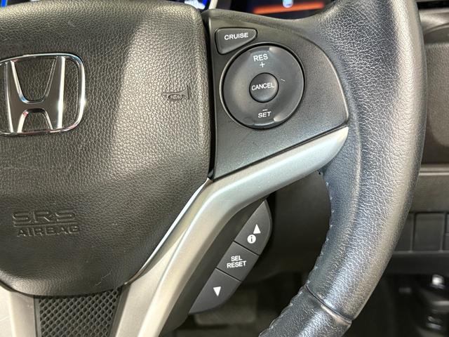 フィットハイブリッド Ｌパッケージ　ナビフルセグＢカメラＥＴＣＬＥＤＡＷ　ナビ＆ＴＶ　地デジフルセグＴＶ　ＵＳＢ　サイドエアバック　ＤＶＤ再生　バックカメラ　オートクルーズコントロール　ＥＳＣ　ＡＵＴＯエアコン　ＡＢＳ　運転席エアバック（23枚目）